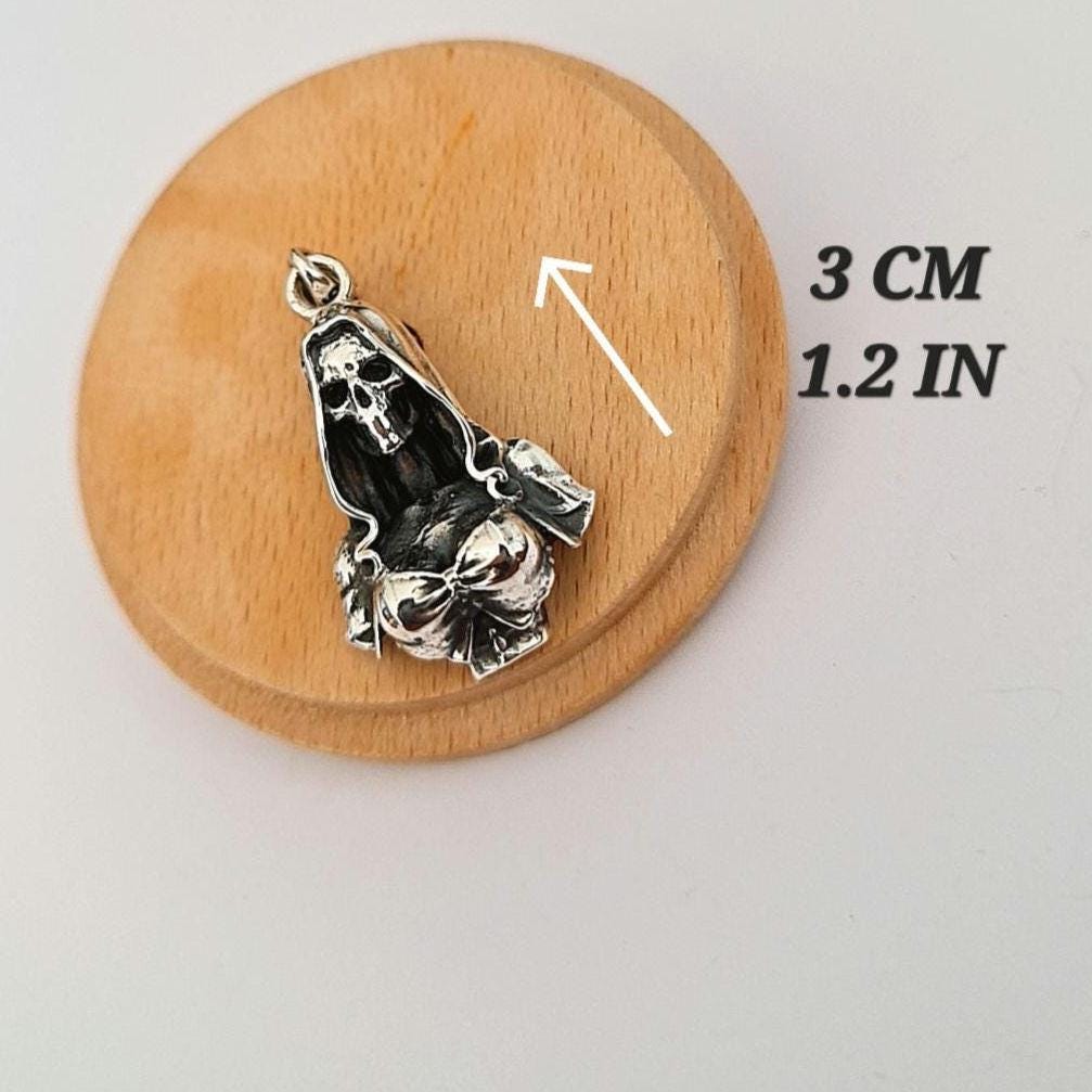 Silver Santa Muerte pendant - Skeleton Goddess in Hooded Cloak and Bow-Tied Top Gothic Death Jewelry