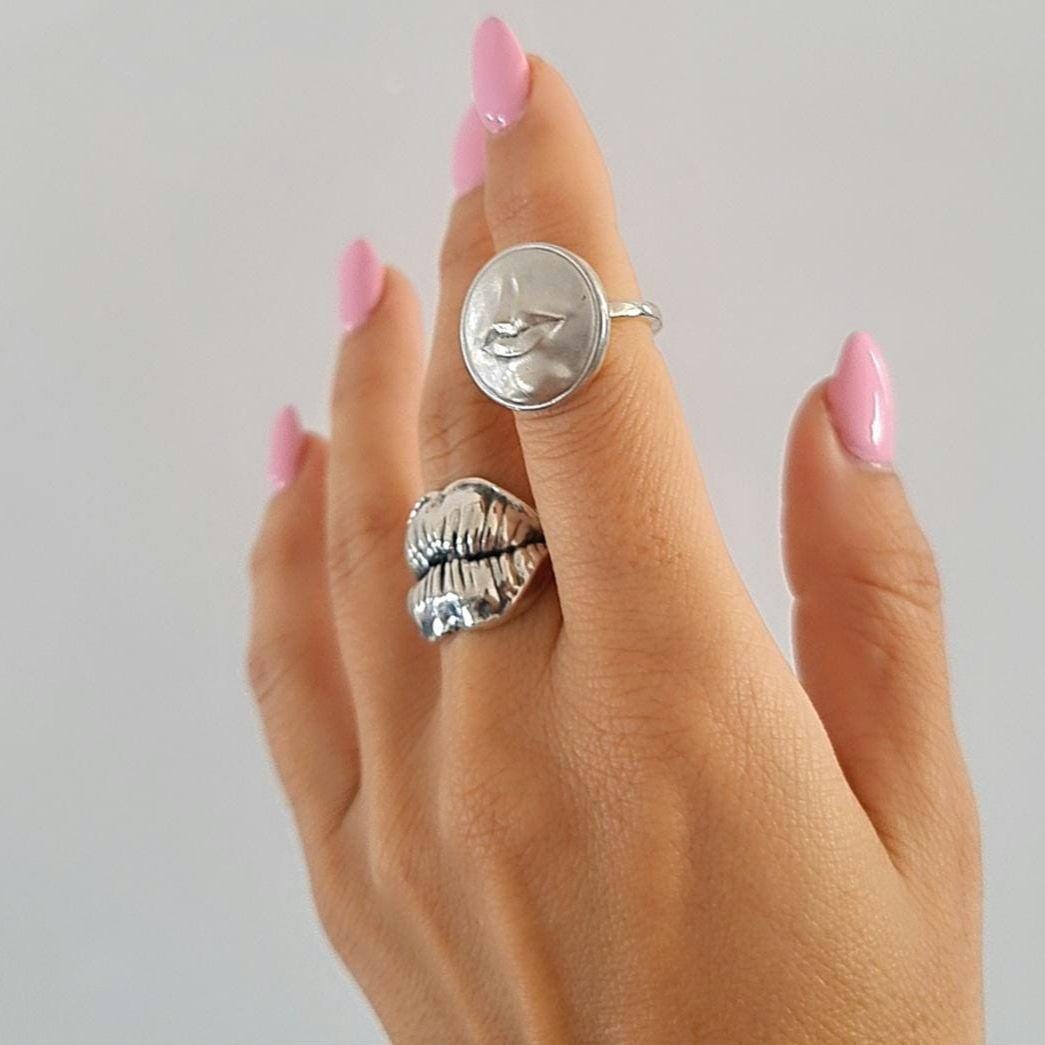 Kissing Lips Ring - sterling silver masterfully designed to convey a message of love & affection