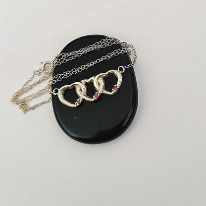 Sterling Silver Interlocking Hearts Necklace: Red Stone Accents, Romantic Gift
